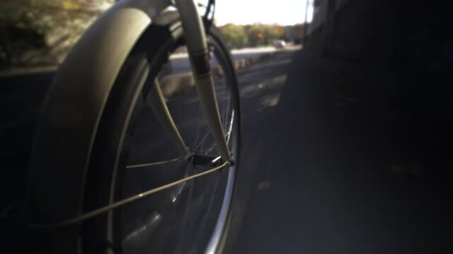 Person Entraina chooses an eco-responsible transport such as the city bike to get to work, to go for walks in the streets of the city of Montpellier located in France. High quality 4k footage