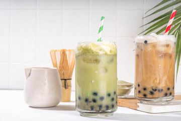Classic and green matcha boba bubble tea with tapioca pearls