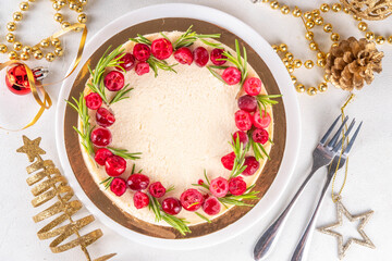 Christmas cheesecake with cranberries and rosemary