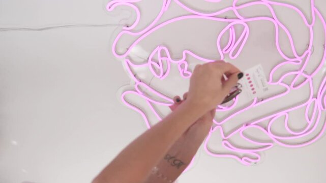 A woman makes a note of visiting a beauty procedure in a beauty salon. Vertical video - Powered by Adobe