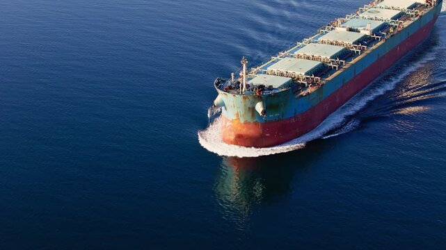 Bulk cargo ship underway in sea. Bulker for Dry cargo carrier, merchant ship to transport bulk cargo such as grains ore coal