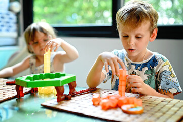 Sibling with board game