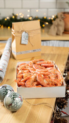 Langoustine shrimps in a box on the New Year's table