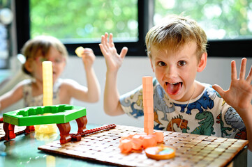 Sibling with board game