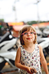 Little girl with ice cream. Thailand