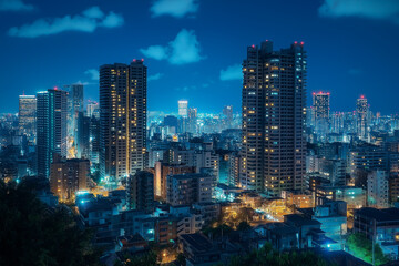 Obraz premium A city skyline at night with many tall buildings lit up. Scene is serene and peaceful, as the city is quiet and the lights create a calming atmosphere