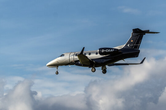 Geneva, Switzerland - november 27, 2024 : sign and logo on an airplane Embraer 505 Phenom 300 of  Arcus-Air landing at Geneva Airport