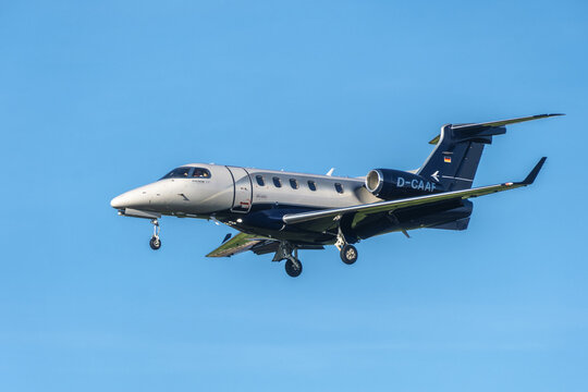Geneva, Switzerland - november 27, 2024 : sign and logo on an airplane Embraer 505 Phenom 300 of  Arcus-Air landing at Geneva Airport