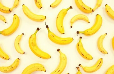 Bananas are arranged in a pattern on a white background