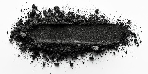 Black powder spread evenly across a white surface, creating a striking contrast in texture and color