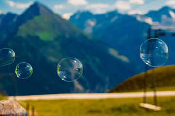 Alpine summer view with soap bubbles at Mount Penken, Mayrhofen, Finkenberg, Zillertal valley, Schwaz, Zell am Ziller, Tyrol, Austria