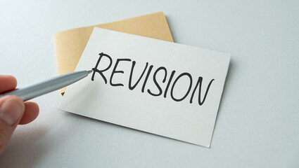 Revision - process of reviewing or making changes to something that has been previously created or written, text concept with pan