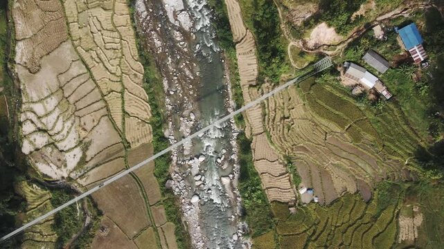 aerial view of river and paddy farmland in Nuwakot, Nepal.