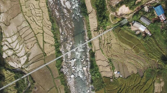 aerial view of river and paddy farmland in Nuwakot, Nepal.