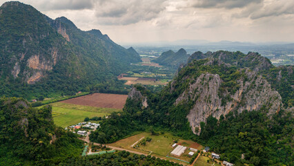 Aerial of Ban Chai Khao limestone mountains in Thailand Uthai Thani province , drone fly above famous Thai-Switzerland 