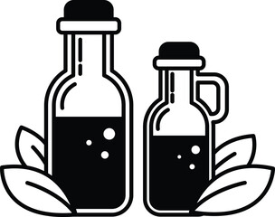 Two bottles of liquid with a leaf in front of them