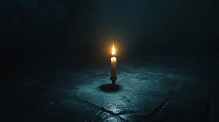 Fototapeta premium Single candle flame in dark room.