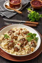 beef and rice in white bowl, top view