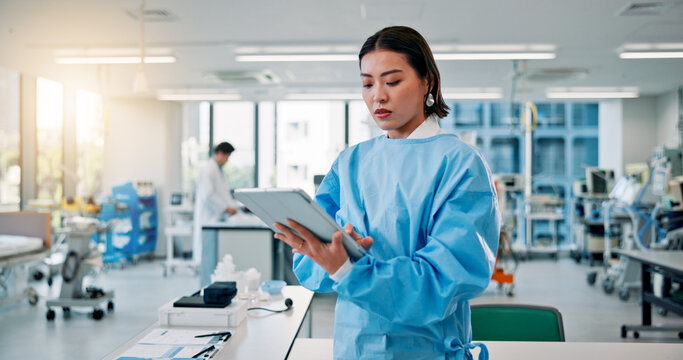 Man, scientist and serious on tablet at laboratory for medical research, investigation or results on vaccine tests in Japan. Female person, healthcare professional and innovation on drug trial report