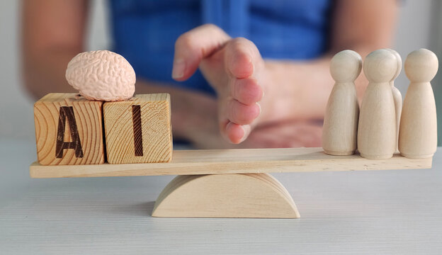 Balance between artificial intelligence and human intelligence represented through wooden figures concept