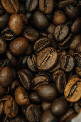 many coffee beans, selected focus, coffee close-up