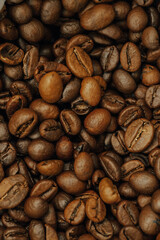 many coffee beans, selected focus, coffee close-up