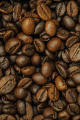 many coffee beans, selected focus, coffee close-up