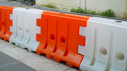 traffic barricade plastic blocks on the roadside