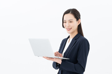 パソコンを持つビジネスウーマン
