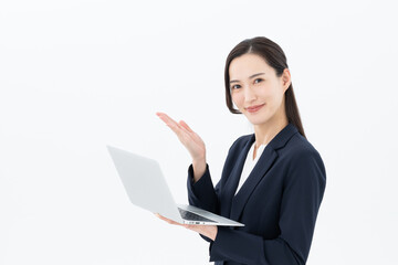 パソコンを持つビジネスウーマン