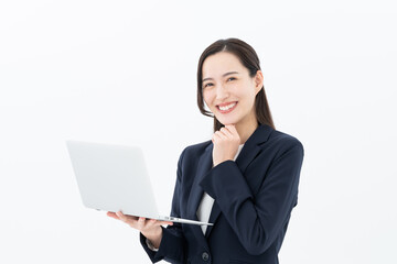 パソコンを持つビジネスウーマン