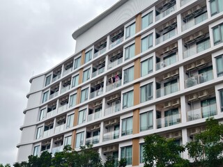Detailed view of windows, doors and balconies of city buildings 