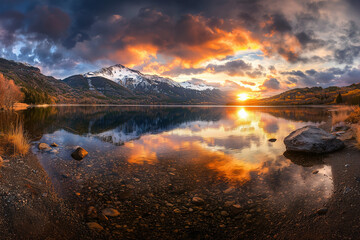 Fiery Skies: Storm and Sunset Reflected on a Serene Lake