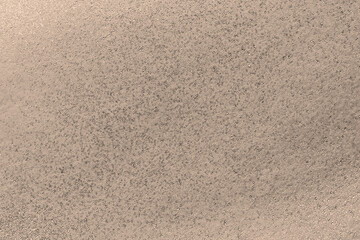 Textured shiny beige background for design