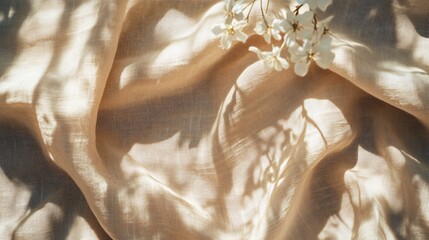 Elegant Beige Linen Fabric Texture with Natural Floral Details and Folds