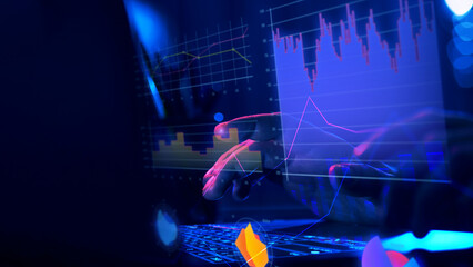 Business person navigating digital financial charts and graphs on screen, representing financial...