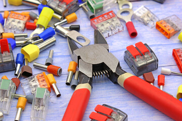 Electrical installation tools and materials for the assembly of electrical equipment. Soft focus. Close-up.