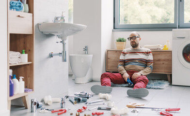 Desperate man unable to fix his broken sink