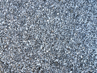 Obraz premium Small grey gravel stones for texture and background