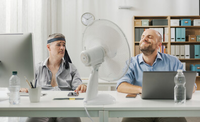 Funny business people in the office during the summer
