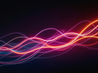 Abstract light trails flowing smoothly in the dark