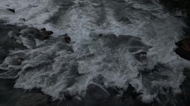 Dora baltea river rushing through aosta valley November