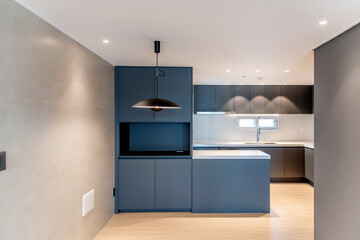 interior of the modern kitchen in the apartment
