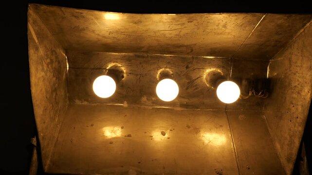 Light bulbs consequently lit in the old reflective lamp