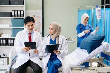 Fototapeta premium Medical, meeting and laptop for team in discussion, brainstorming and planning. Doctor, nurse on desk