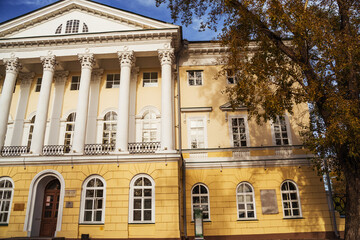 Fototapeta premium Elegant facade of a historic building with columns in Irkutsk, showcasing its beauty. Irkutsk city, historical building.