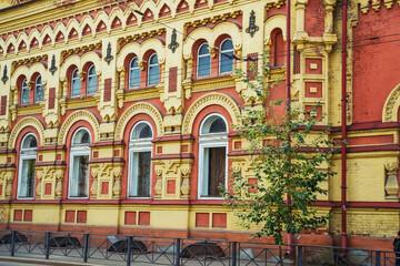 Fototapeta premium Historic Irkutsk building showcasing unique architectural style in autumn light. Irkutsk city, historical building. 