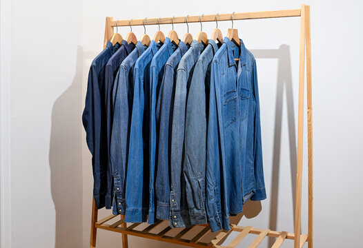 Denim shirts hanging on a hanger