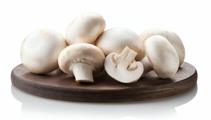 Fresh white mushrooms on a textured surface isolated