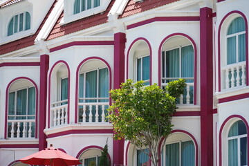 Detailed view of windows, doors and balconies of city buildings 